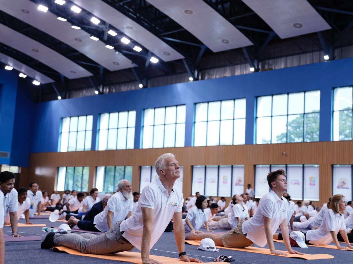 g20org's tweet photo. Let's harmonise our minds &amp; bodies together! 🧘‍♀️

#G20India delegates participated in large numbers at the #InternationalDayofYoga2023 celebrations led by Minister @dpradhanbjp on the sidelines of the #4thEdWG Meeting. #YogaforVasudhaivaKutumbakam #G20Edu4all https://t.co/b4CcVjJCal