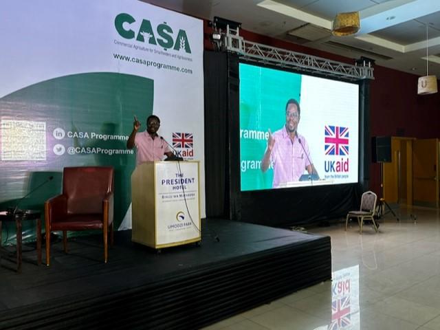 The stage is set for the Malawi Agribusiness Investment Meeting at the BICC in Malawi.  Innocent Thindwa of CASA Malawi is testing the microphones and we are good to go!.