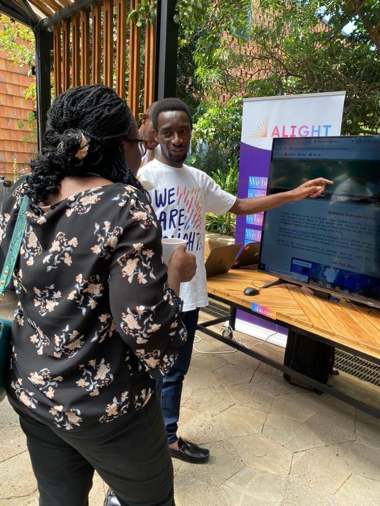 AlightRwanda's tweet photo. Alight participated in the World Refugee Day Exhibition in Kigali. We were delighted to have the Minister of Disaster Management visit our stand! #FindOthers #ChooseOptimism https://t.co/a7Y1lnAE3O