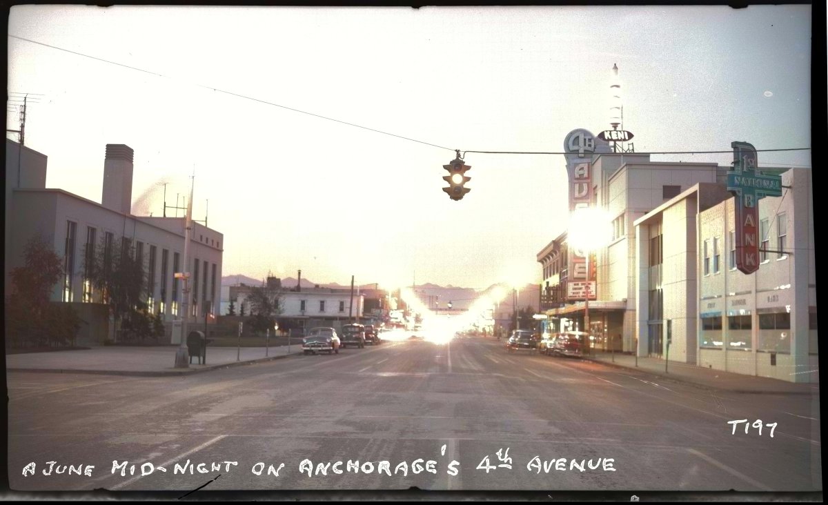 A June 1954 midnight on Fourth Avenue in Anchorage. 'Night People' is playing at the Fourth Avenue Theatre. Via Anchorage Museum, colorized at Palette.fm #alaskahistory #alaska #anchoragehistory #SummerSolstice