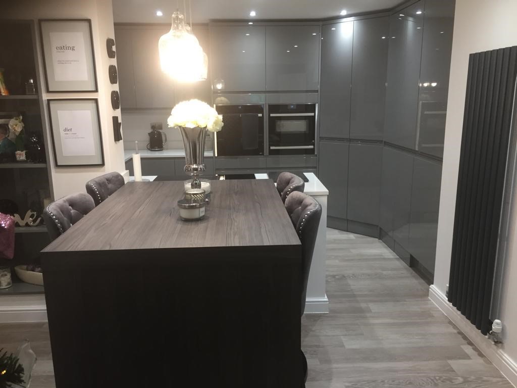 JMIbristol's tweet photo. A Rimini gloss handless kitchen with ArenaStone Quartz worktops we fitted recently in Hanham.  The utility room is accessed through a secret door in the larder unit.
@Bristol_Marble @NeffAppliances @PebbleKitchens 
#kitchensBristol #kitchens #Quartz #kitchenappliances https://t.co/iSP3HEVPVR