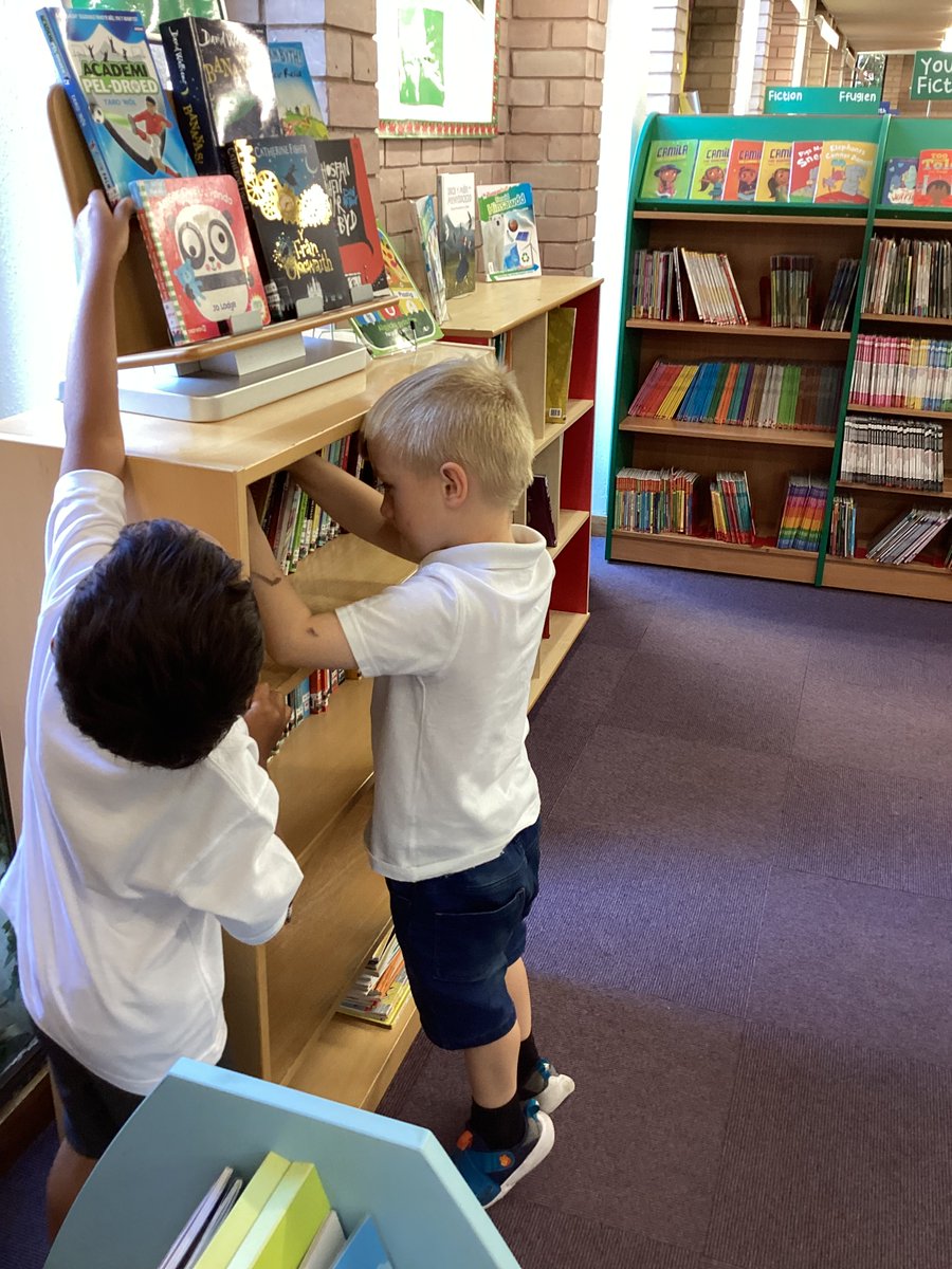 HafodyWern's tweet photo. Reception pupils have enjoying visiting @WxmLibraries over the past two weeks. Thank you Nerys for sharing some stories with us and showing us how a library works. #languageliteracyandcommunication https://t.co/UrHz9b5goS