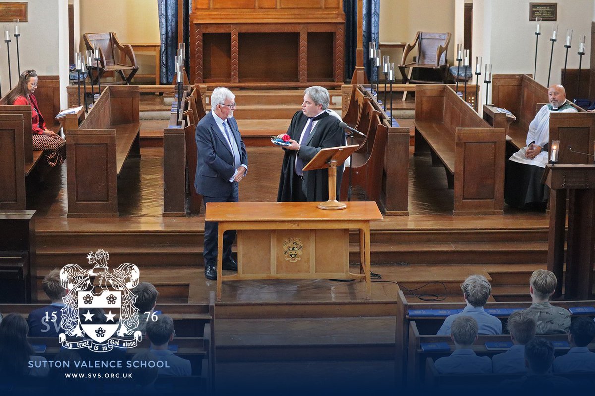 SVS_News's tweet photo. Each Midsummer Day since 1957, representatives of Sutton Valence Parish Council have joined us for the Rose Ceremony, 'paying' us the rent of one red rose for the lease of Sutton Valence Village Green for 99 years. 🌹

Today they were welcomed by  @SVS_Headmaster during Chapel. https://t.co/c31DXp9nC2