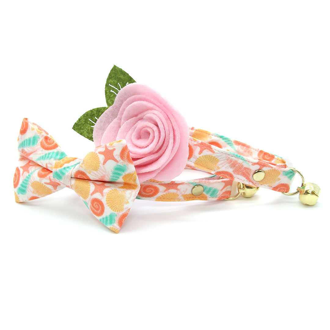 Channeling aspirational beach vacay vibes since it's the first *official* day of Summer!☀️ 🌴🌊🐚 This super cute #seashell print is one of our favorite new styles from the Summer Collection. Available in #catcollar, #catbowtie + #catbandana options.🧡 bit.ly/2Bhlwx2