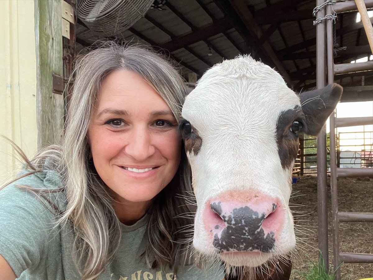 It’s #NationalSelfieDay! This is my daughter’s bottle calf. Aren’t we cute? #farmseflie