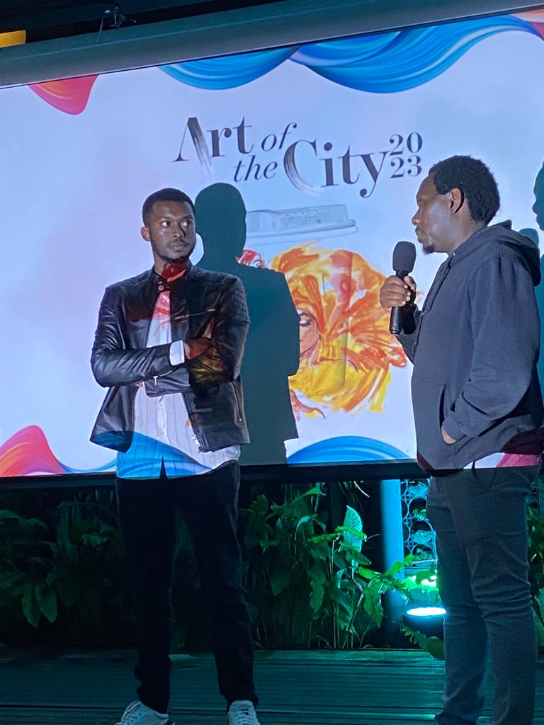 Our able judges, Cyprian Kiswili who is our winner for the 1st #Artofthecity edition and Adrian Nduma a Kenyan based talented artist who we've been privileged to feature in our branches are in attendance 

#Herstory #Artcaffe