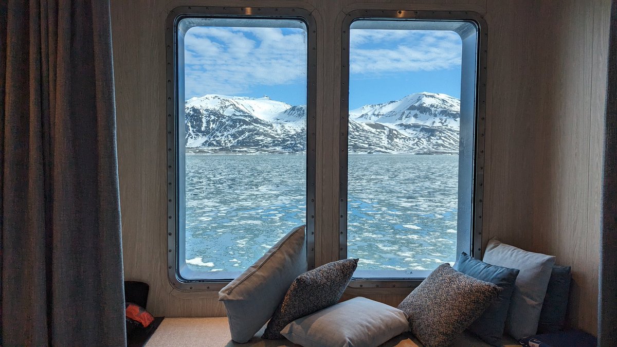 InTheLoopTravel's tweet photo. The view from my cabin this afternoon as we sail in icy Svalbard in the high Arctic with @LindbladExp and @NatGeoTravel in #NatGeoResolution. https://t.co/jzOn8QmfnM