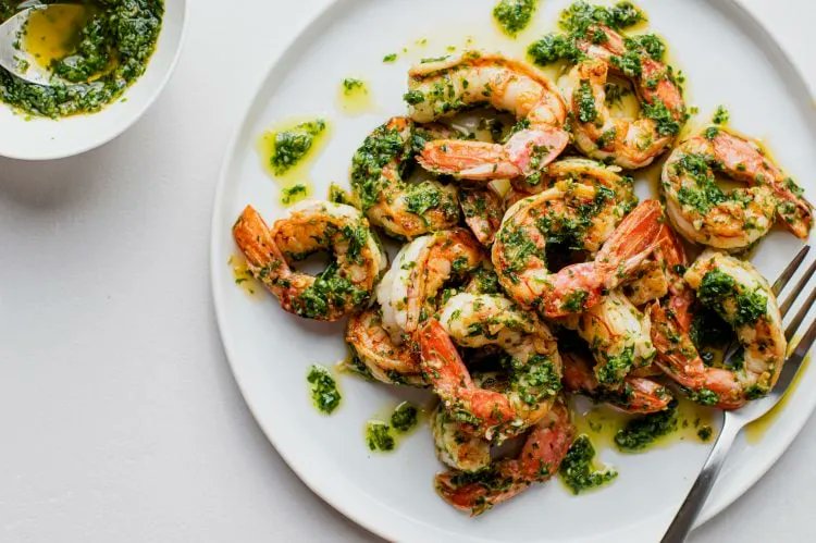 Rich in tangy, earthy flavors, this Fast and Flavorful Chimichurri Shrimp is a delicious, high-protein meal. buff.ly/3PrIoxl #ketorecipes