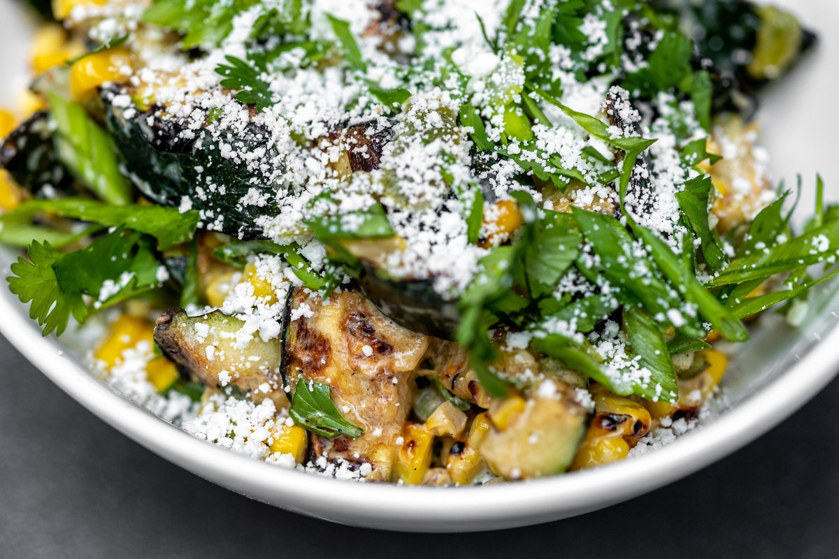 know summer eating is in full swing when I'm grilling up zucchini, and this salad, which also has charred corn and a sour cream and lime dressing, is a great way to enjoy it: bit.ly/3qWV0CF