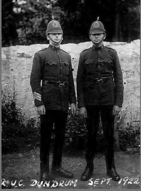 A sergeant and constable of Dundrum RUC 1922.
RUC founded on 1 June 1922 as a successor to the Royal Irish Constabulary (RIC). Uniforms suggest pre-transition.