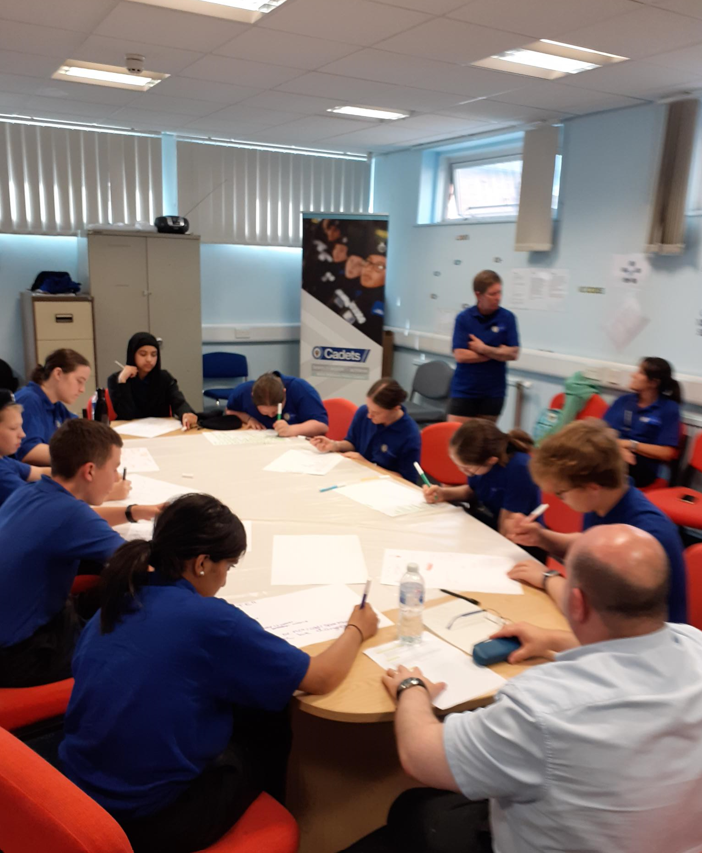 CadetsWMP's tweet image. Gr8 #opportunity #5BE #Kingstanding @ErdingtonWMP Cadets take tips &amp;amp; guidance from @si_the_voicepro . Leaving tonight, our Cadets said they were more confident for their English speaking exams &amp;amp; in life where their voices need to #resonate  @NationalVPC @CSuptMatShaer 👏👮‍♂️📣👮‍♀️👏