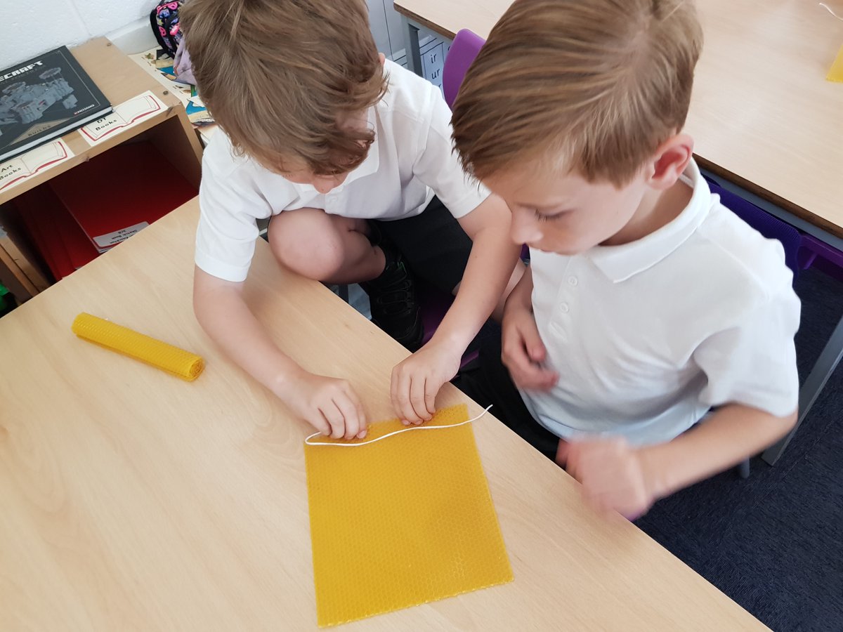 Emmaus_School's tweet photo. #EmmausY3 had a fascinating lesson learning about all the products made by bees. 🐝 We used beeswax sheets and cotton cord to roll our own candles which we can burn at home.🕯️ #EmmausScience https://t.co/IqdWmRaOzf