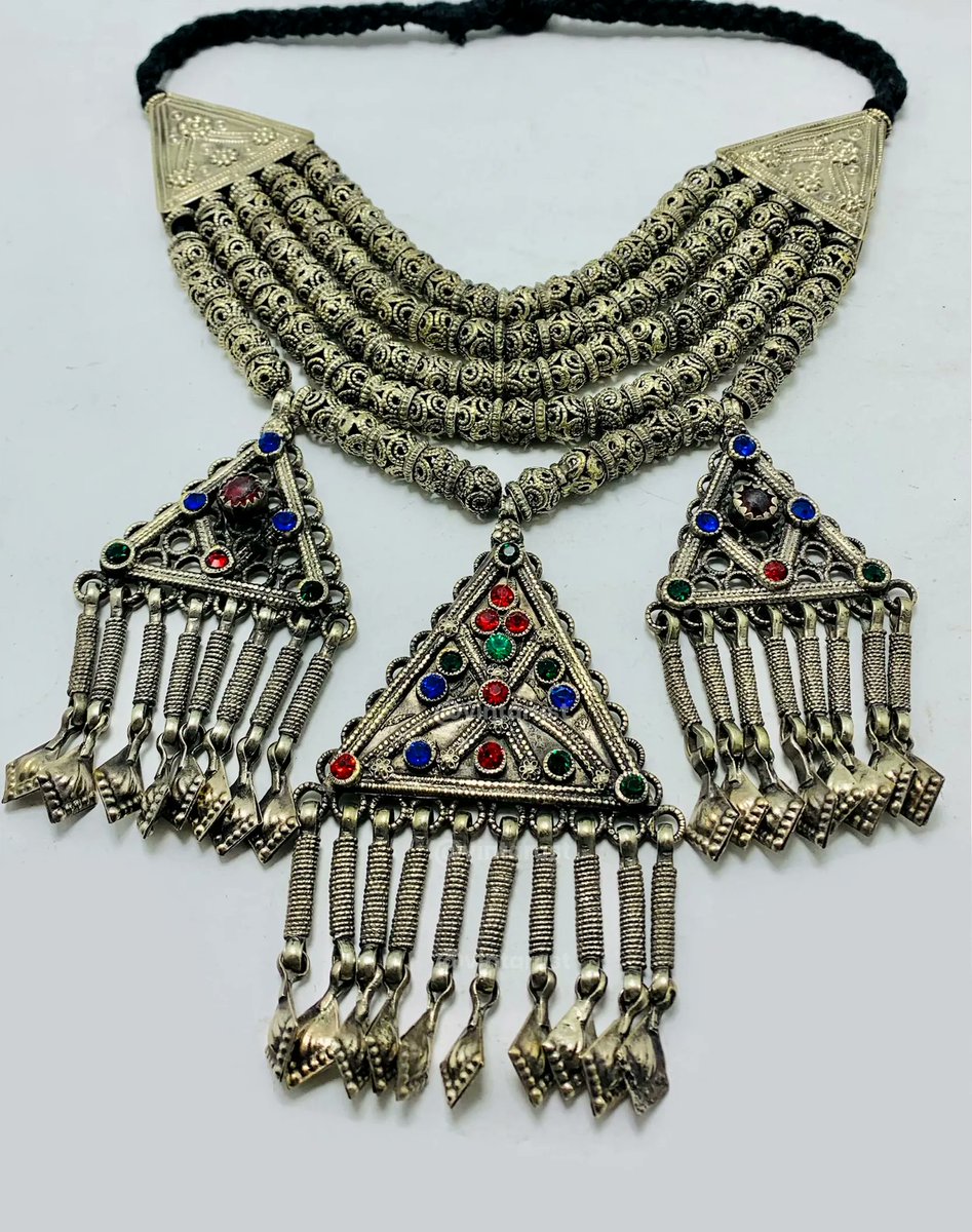 Handmade Tribal Tuareg Necklace With Beads. 

Shop Now:
buff.ly/3Xhn7Ze

#tribaljewelry #vintagenecklace #massivenecklace #multilayernecklace #antiquejewelry #silverpendants #glassstones #centralasianartistry #beadednecklace #ancestralcharm #statementpiece
