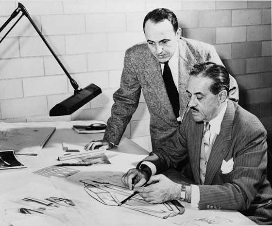 Robert Bourke (standing in the photo) was an auto designer in Raymond Loewy's (sitting) Studebaker studio. In the post-#WWII era, Bourke produced some great looks for the South Bend, IN-based automaker. Learn about his career in our newest #StoryoftheWeek motorcities.org/story-of-the-w…