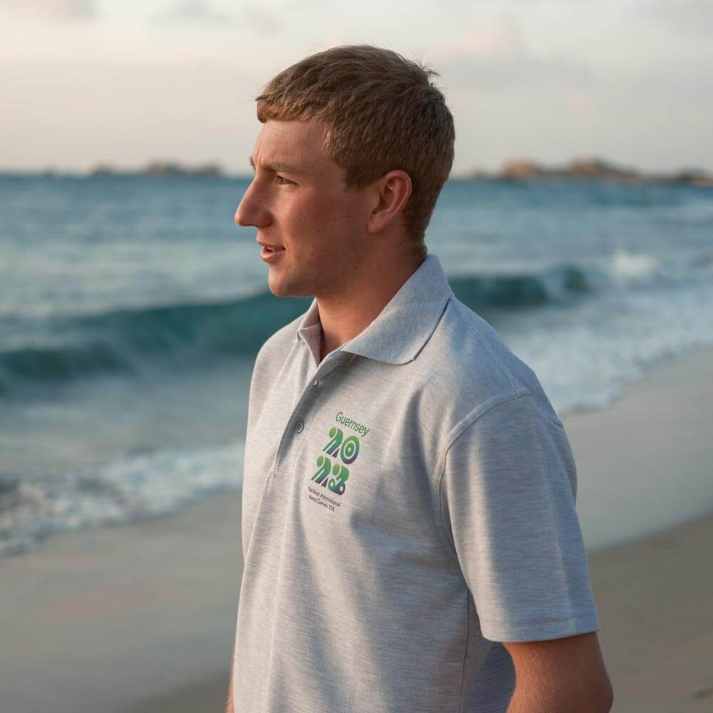 Guernsey_2023's tweet photo. Exciting News! 🎉 The official Island Games Merchandise is now available online and in stores! You can find the 'Merch' at multiple retailers, including Beau Sejour, Iceland, Morrison and Checker Express stores and from our printing partner -  https://t.co/aHA2URJA3u https://t.co/B3iXg85TDe