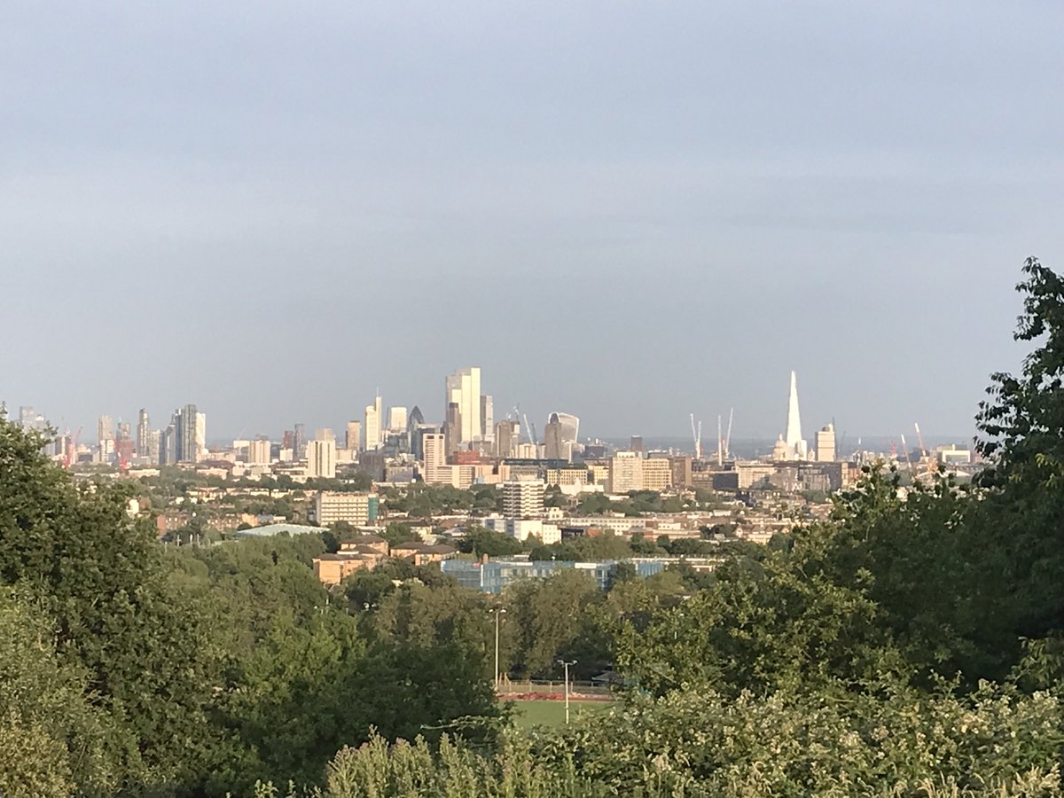Joining a solstice picnic on #HampsteadHeath, we found other groups with the same idea. The Highgate church spires of St Michael, St Joseph & St Anne set a backdrop to the east; the City’s iconic towers caught the late sun; St Paul’s remains visible among its taller neighbours.