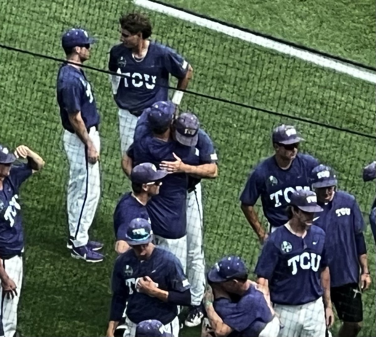 swaggarly's tweet photo. #TCU players and coaches are sharing hugs after a season ending loss in the College World Series semifinal.

Since May 1, the Horned Frogs have won 21 of 25 games. Prior to the #MCWS TCU swept the Big 12 Tournament, Fayetteville Regional and Fort Worth Super Regional. https://t.co/hlM91CO5Gf
