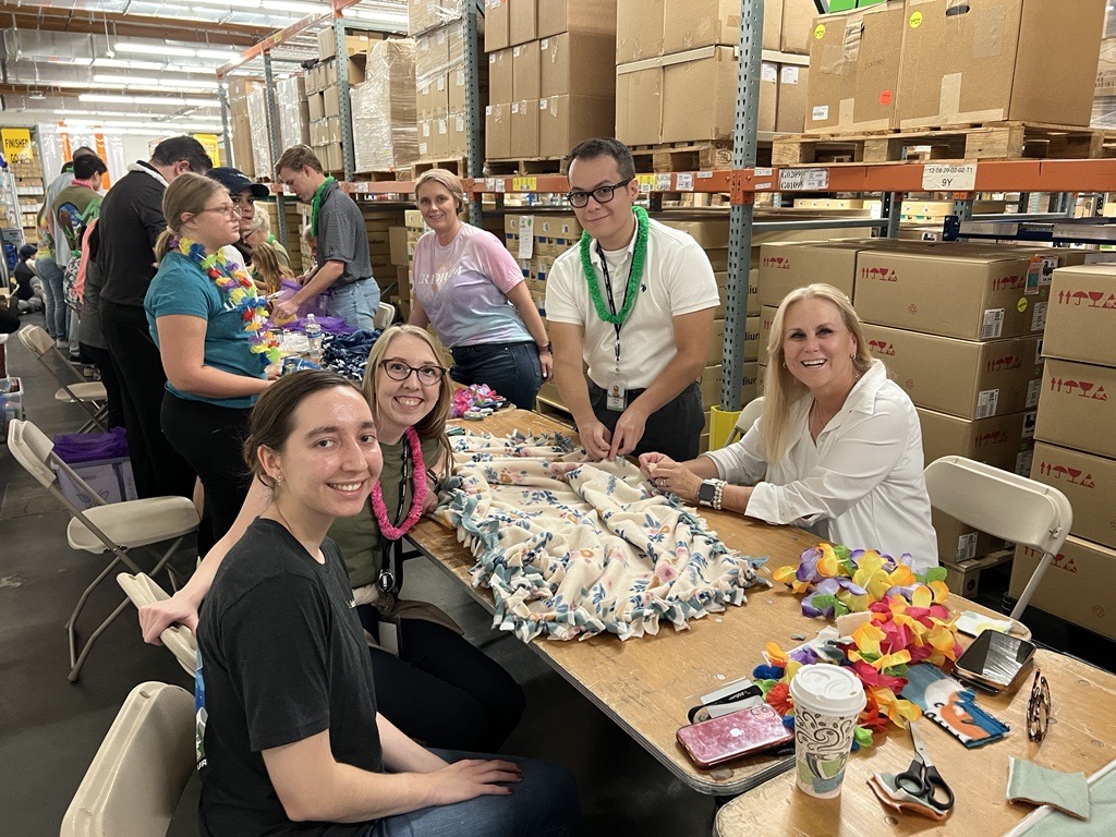 IridiumComm's tweet photo. For Iridium #ImpactDay, our Arizona offices teamed up with Amanda Hope Rainbow Angels (@ahrangels) to make blankets and care kits for kids and families who spend an extended amount of time in hospitals 

Truly global starts local 🌐 #IridiumCares https://t.co/DZ03g6z2g3