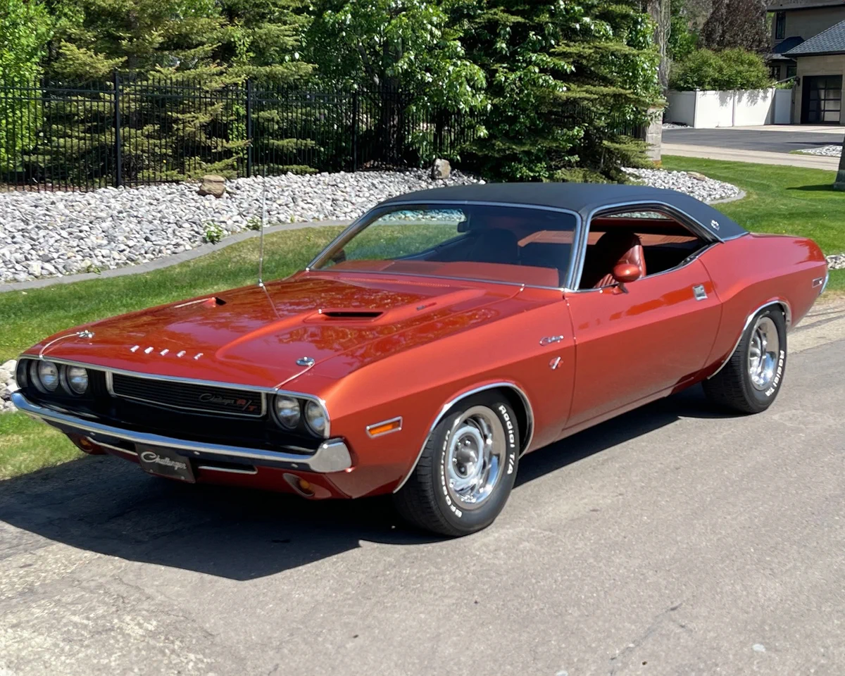 Lot #445
This 1970 Dodge Challenger is a factory R/T SE that has undergone an extensive restoration, with only 104 miles since its completion in 2023. It is outfitted with its factory 383/335hp Magnum V8 matching-numbers engine with a 4-barrel carburetor and TorqueFlite 3-speed automatic transmission. It is restored back to its factory K5 Dark Burnt Orange Metallic with a black vinyl top and special-edition small back window, complemented by a fully restored matching interior. The Challenger R/T SE edition came highly optioned with hood release under the dash, four-way power windows, rim-blow steering wheel, Rally dash, dual exhaust with chrome tips, buckets and console, power steering, disc brakes, factory vinyl top, overhead console and factory air conditioning. Every nut and bolt have been meticulously restored to factory specifications. The car still retains its original Data Tag. It is one of 2,076 Challenger R/T SE 383ci cars produced in 1970 and is highly optioned.