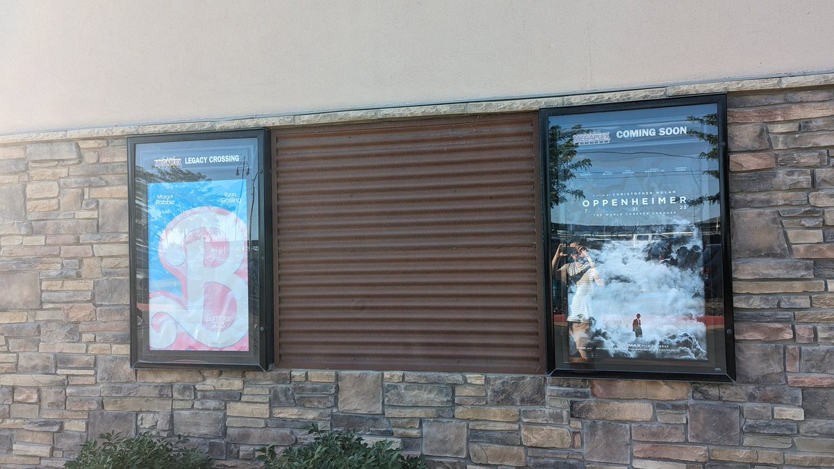 connor_bond's tweet photo. what if we kissed 😳😳 in between the barbie and oppenheimer poster 👉👈 https://t.co/dygxfdIH0w