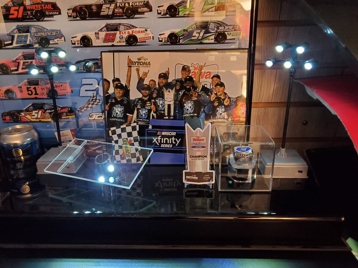 j_anselowitz's tweet photo. So with the recent package from @flynformracing, and the Daytona win diecast coming soon(ish), I had to get a display ready for that and update my @JClements51 wall a bit.... and #nascarkitty's boyfriend has a difference of opinion on who actually owns that wall 🤣 https://t.co/xh4oKOjyRR