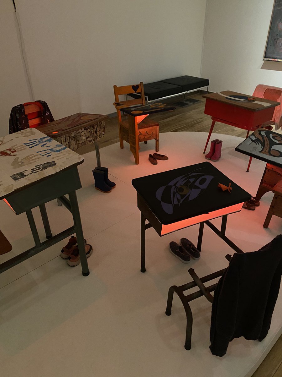 BCAnglican's tweet photo. Included is a moving installation that includes desks — reclaimed and painted, with children’s footwear and clothing. https://t.co/aInWXaPIle