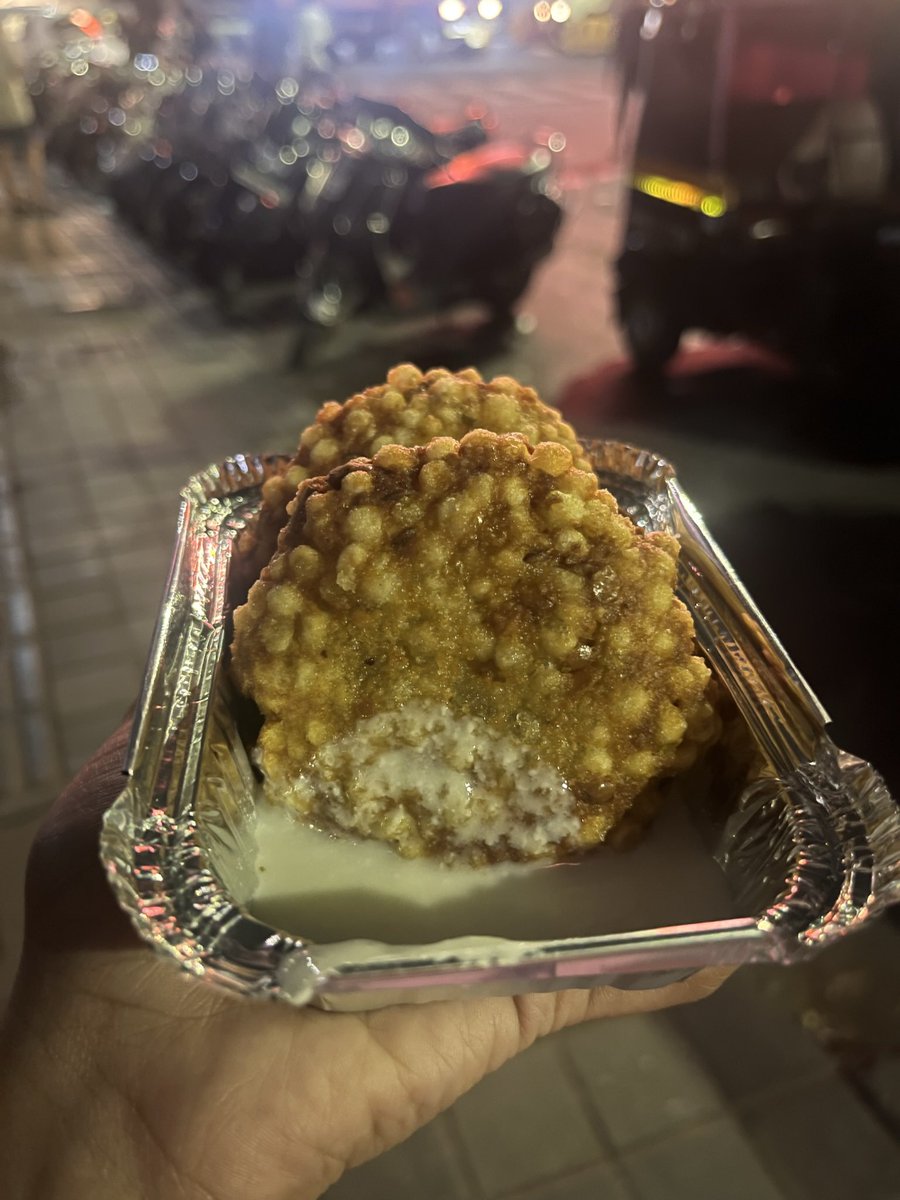 Had #Sabudana_vada at 1:30 AM in #Pune. It has mild flavours and at first glance I thought it was served with #chutney, but it was cold sweet #curd. It went really well with the crispy hot vada! #PuneFood #midnightsnack