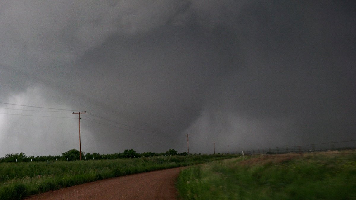 Delayed report.  Wedge tornado earlier north of Matador.  Pulled from dash cam.  @NWSLubbock #txwx   @TxStormChasers