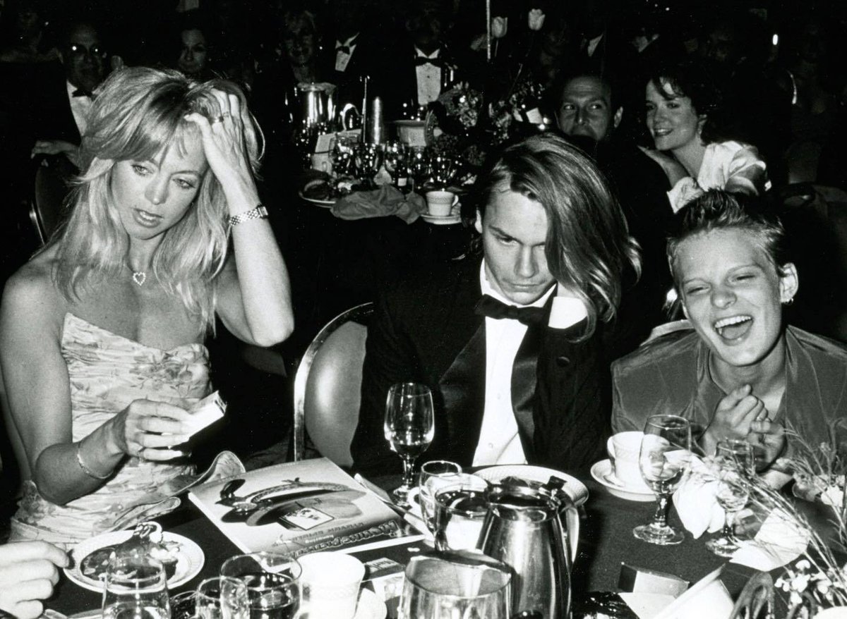 rare photo of river phoenix, martha plimpton and goldie hawn at the picture ball tribute to steven spielberg, 1989