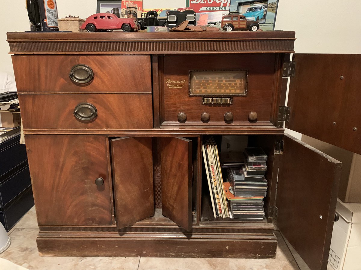 Getting ready to finally put a modern turntable in this Brunswick Panatrope. There’s a turntable in the top left drawer. The bottom left door is a bass chamber for the 12” center speaker. The Right is Record storage