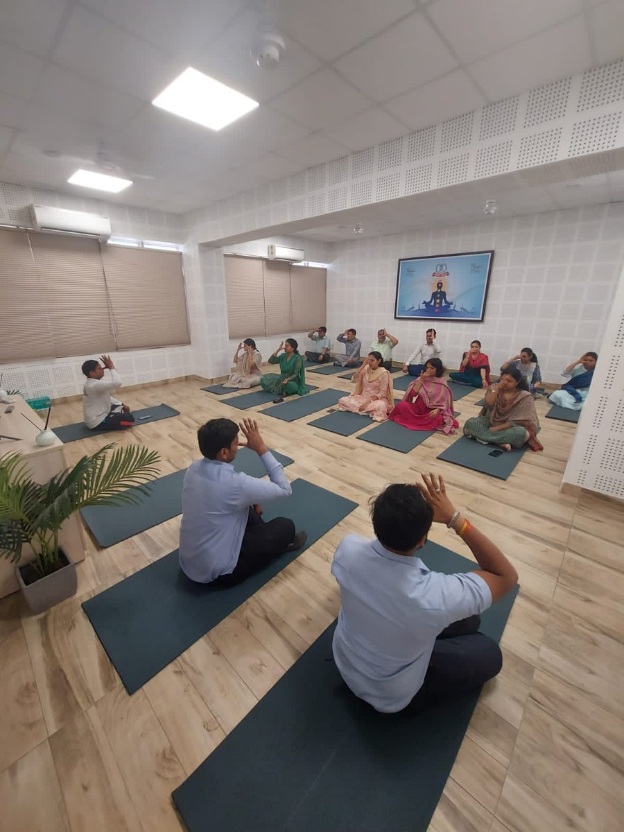 As part of the celebration of 9th International Yoga Day a 60 min yoga session was organized on 21.06.2023 at Yoga Room, Aaykar Bhawan, Laxmi Nagar, Delhi. Yoga Acharya Krishan Shastri conducted yoga session, which witnessed enthusiastic participation. @IncomeTaxIndia #IDY23