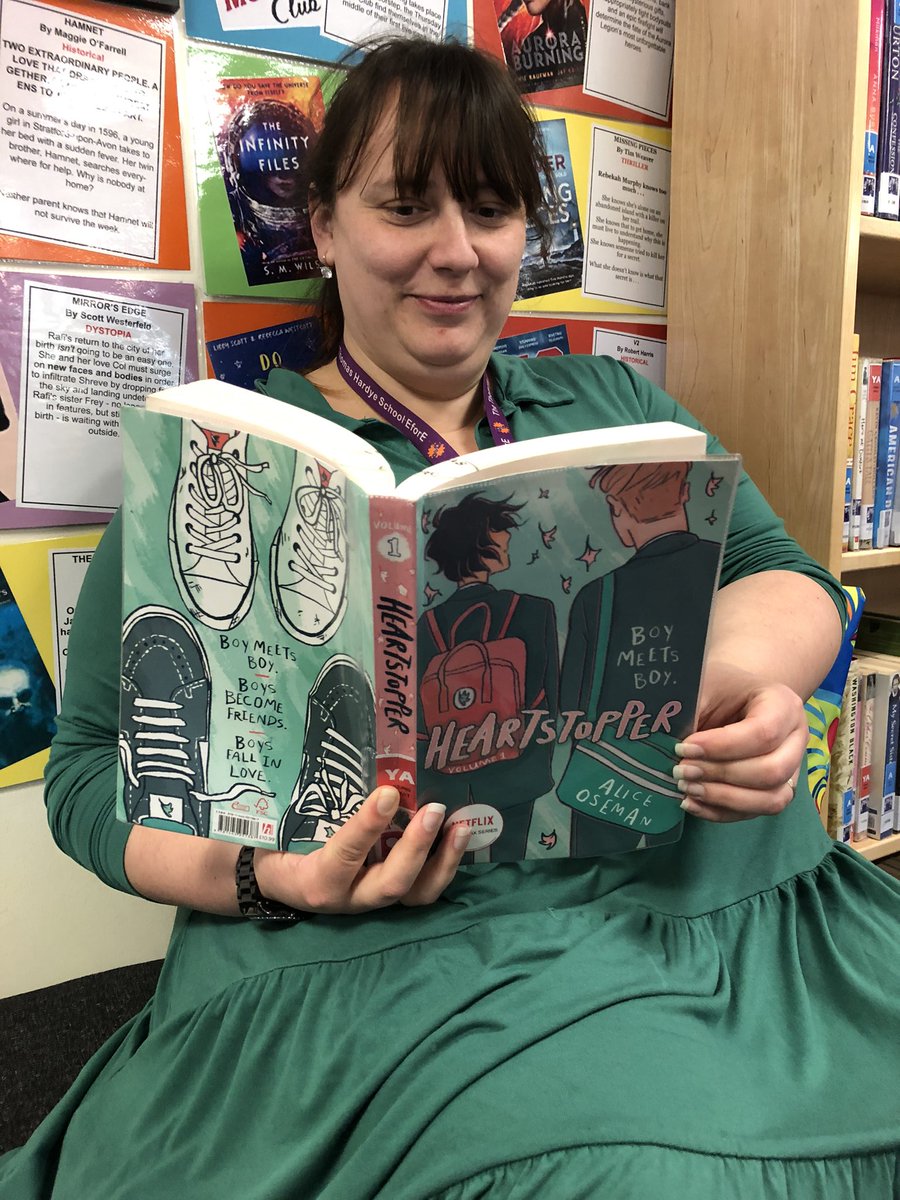 #readwithpride relay @thomashardye continues with Mrs Wilmot enjoying #Heartstopper by @AliceOseman 

She even matched her outfit to the cover! 

#lovereading #readingforpleasure 
@ths_pshce