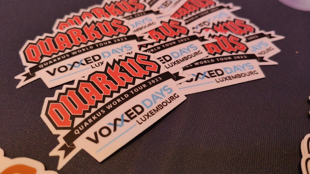 Quarkus collector sticker for @voxxed_lu on the table ! Thank you @kevindubois!