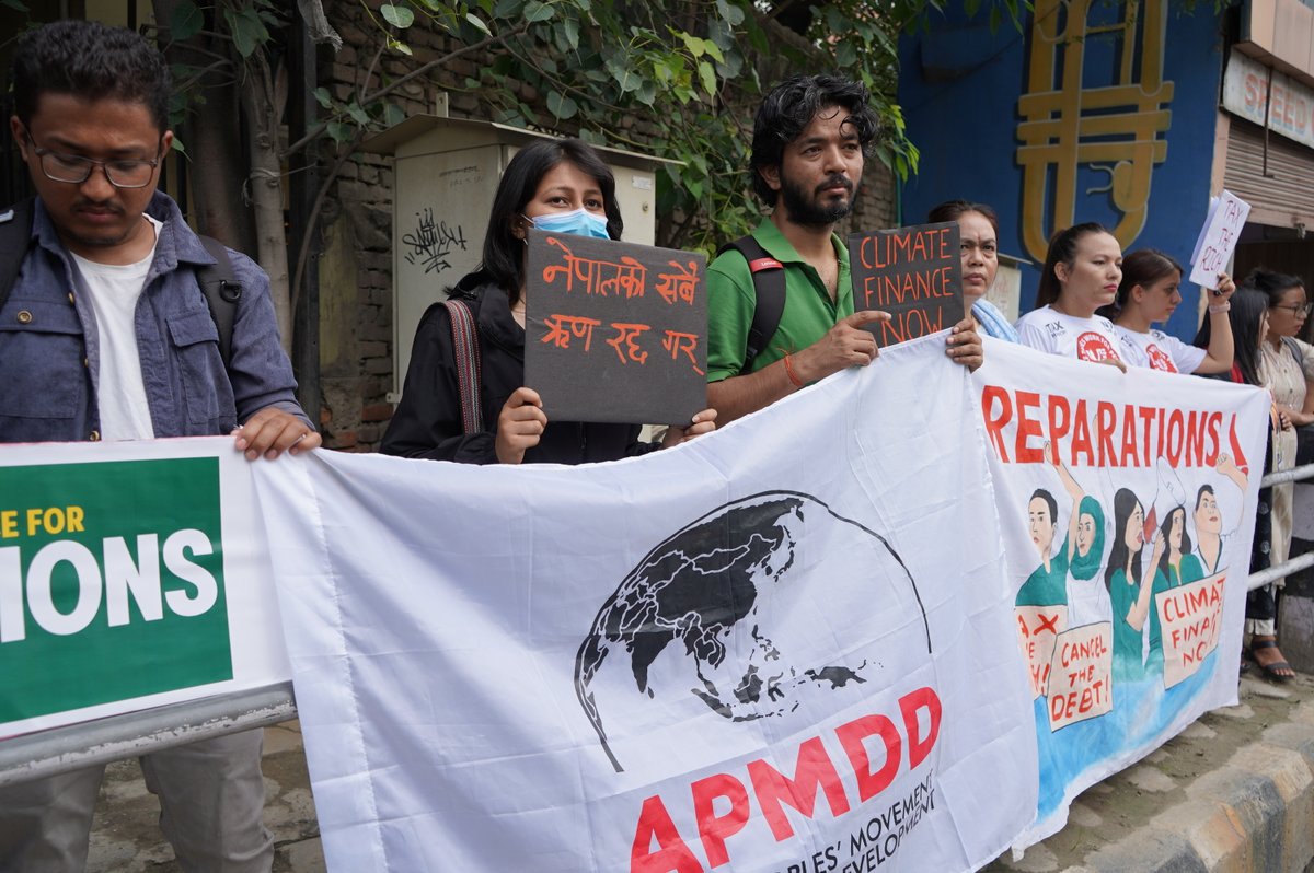 Protest in front of the French Embassy in Kathmandu on the opening day of the Paris Summit for a New Global Financial Pact, demanding “reparations which include adequate and unconditional non-debt creating finance to save people and the planet” @AsianPeoplesMvt #ClimateFinanceNow