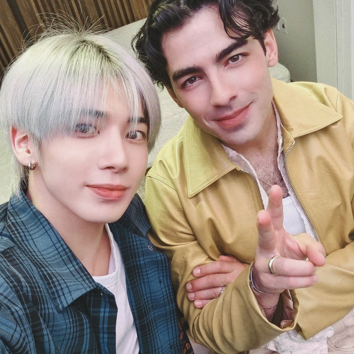 hopetyun's tweet photo. bro for a second i thought taehyun linked arms with joe jonas like oh okay yours then 😭😭😭 https://t.co/RS0OVGtGsw