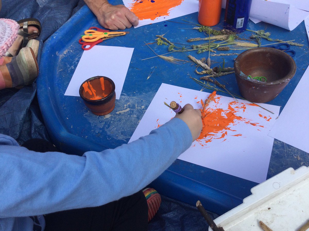 HTAClassSmith's tweet photo. Our wildflower meadow is full of lots of different grasses.We made clay tiles imprinted with the grass heads and painted using grass.We made and lit a fire and toasted marshmallows and  we enjoyed listening to a story.#HTAforestschool https://t.co/msLV9H99xx