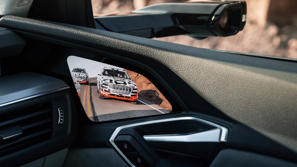 Audi's virtual side mirrors offer enhanced safety, wider view & real-time camera feeds. Elevate your driving experience. No more glare or obstructed views. Available on select models like Audi e-tron & e-tron Sportback. Discover more bit.ly/3nwDAL4 #etron
