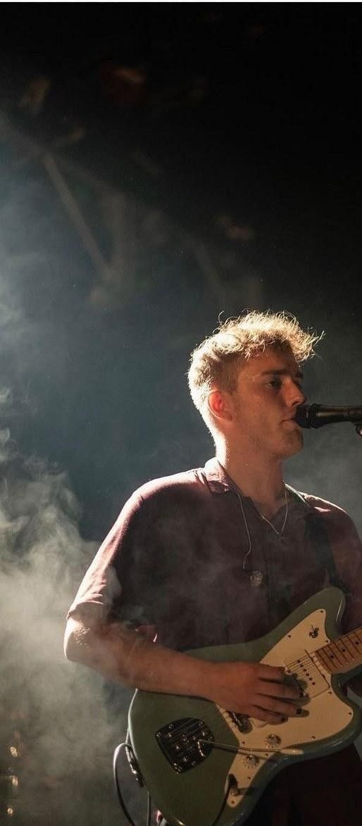 Sam fender in a red shirt to bless your timeline