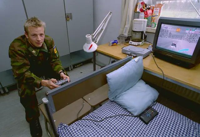 Just an image of Kimi Raikkonen during military service playing Colin McRae 2.