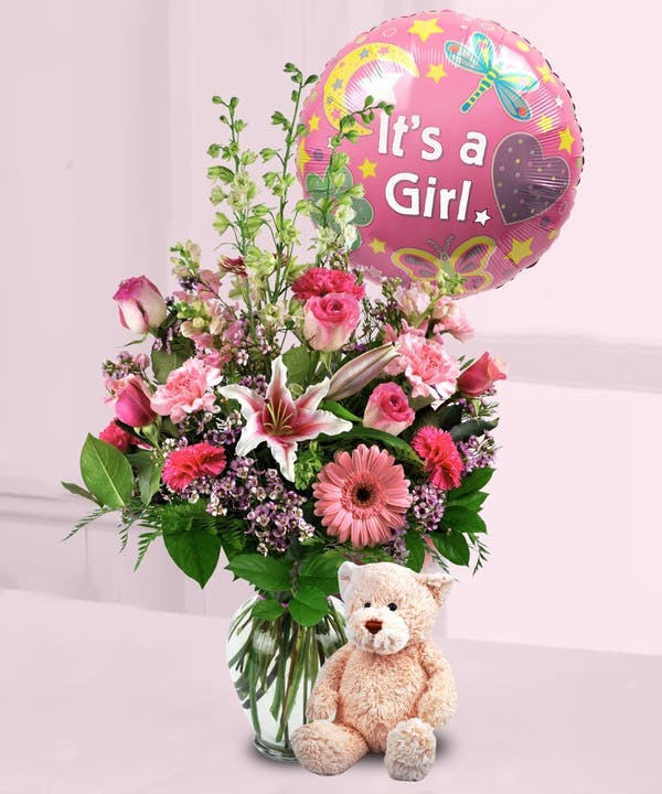 This vase of fresh-cut flowers is just right to celebrate your new arrival. 
Baby Girl Surprise includes a plush teddy bear & a mylar balloon! 
It's time to celebrate this new life, & we hope you'll include us in the festivities!
#newbabyflowers #pughs #memphistn #flowerdelivery