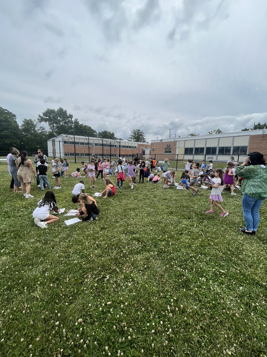 McelweeTami's tweet photo. Second grade tradition- yearbook signing out on Roosevelt field     🖊️💜@OBENSchools https://t.co/hTvciCYD6X