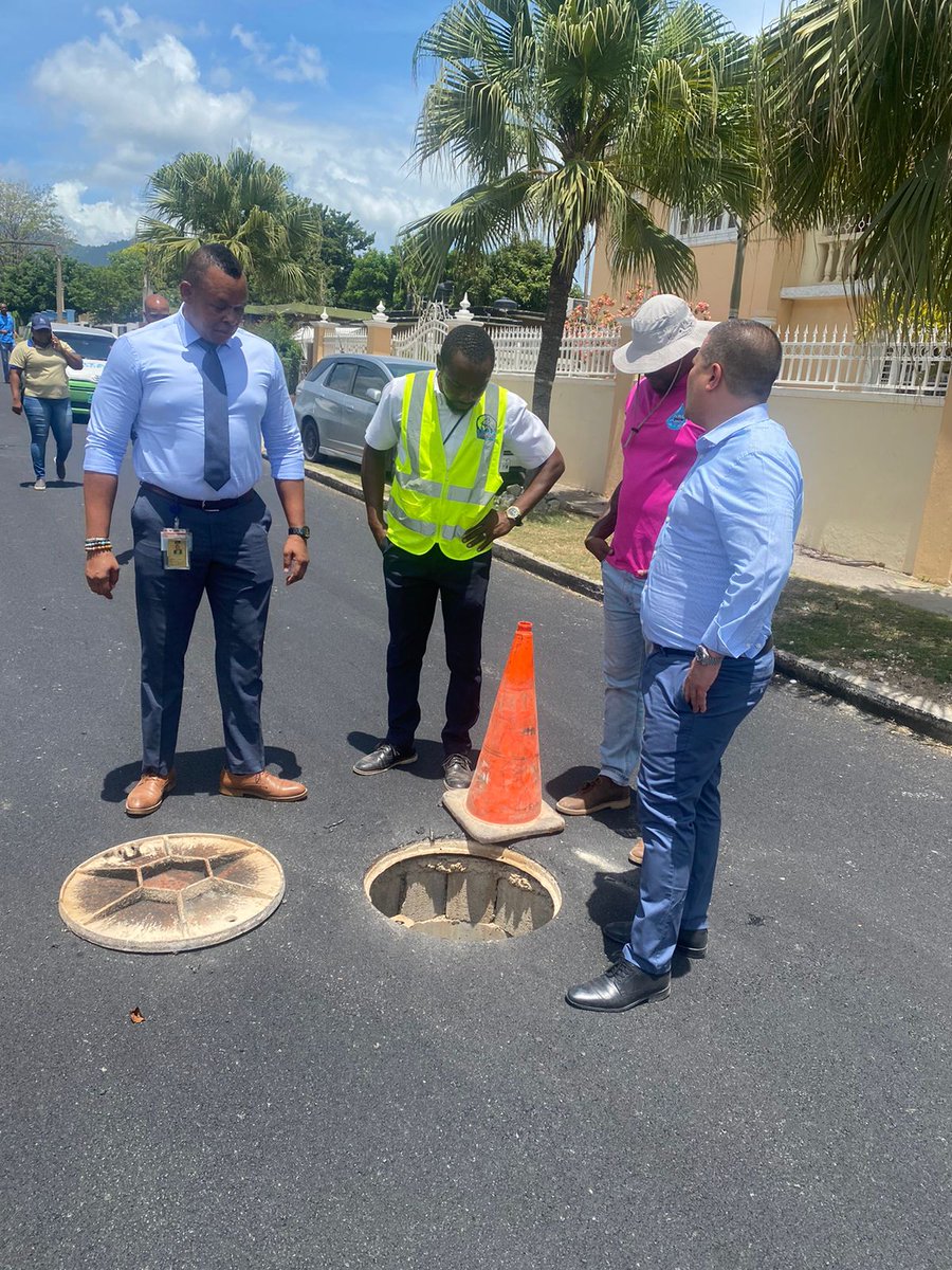 NWCjam's tweet photo. #HappeningNow | Members of the touring team on-site, viewing the sewage lines in the community of Mona Heights. #ImprovingService https://t.co/JVbAbNjoWJ