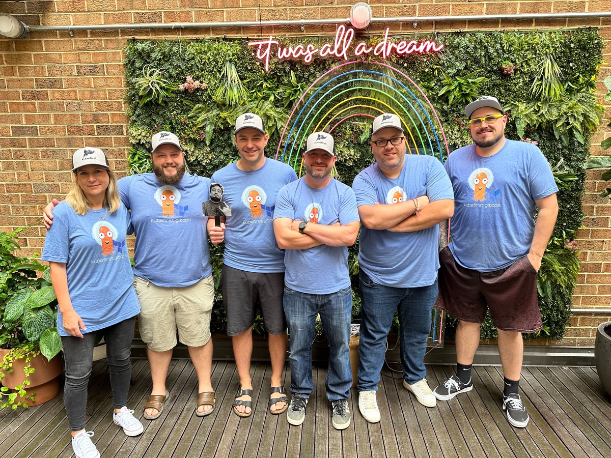 The Kubefirst team was in Washington, DC for our very first team offsite. Here's the lovely folks wearing some vintage kubefirst tees with new, should we say, cool trucker's hats. Cheesy part is us was 'It's the perfect background: it was all a dream, but we made it happen!'