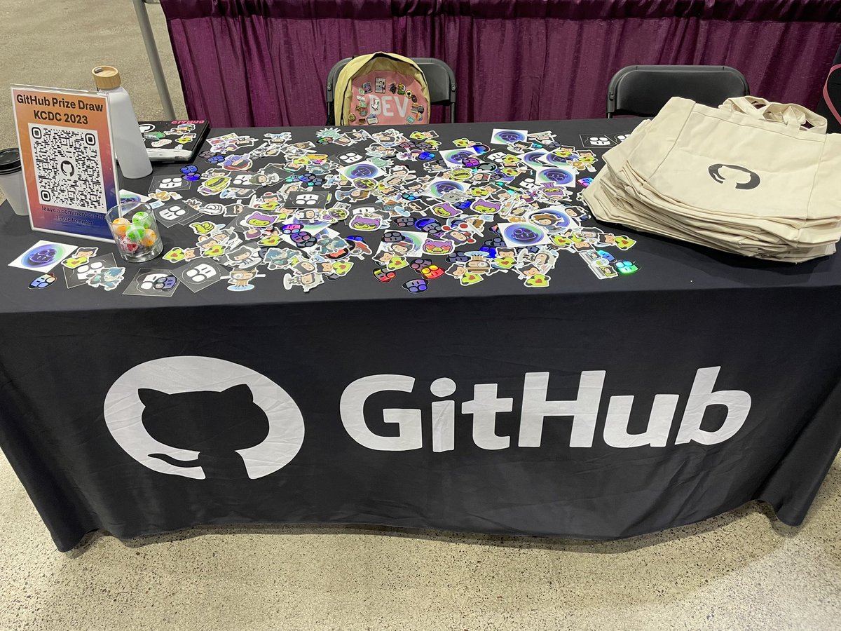 itsthatladydev's tweet image. I’m here at the GitHub booth with @damovisa! Come grab stickers and enter the giveaway for this sweet backpack filled with GitHub goodies! 💃🏽✨ #KCDC2023 #kcdc
