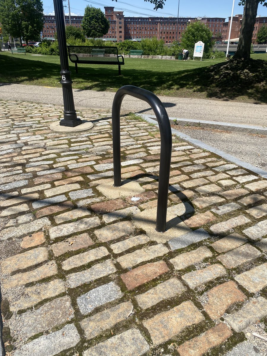 This bike rack at Mechanics Park is a good example of how racks could be installed in the cobblestone bump outs along MainSt which would add more needed bike racks, keep sidewalks clear &amp; help prevent cars from illegally parking on those spots. <a href="/BiddMECity/">City of Biddeford</a> <a href="/mgrohman/">Martin Grohman</a> <a href="/BiddmeWard7/">Liam LaFountain</a>