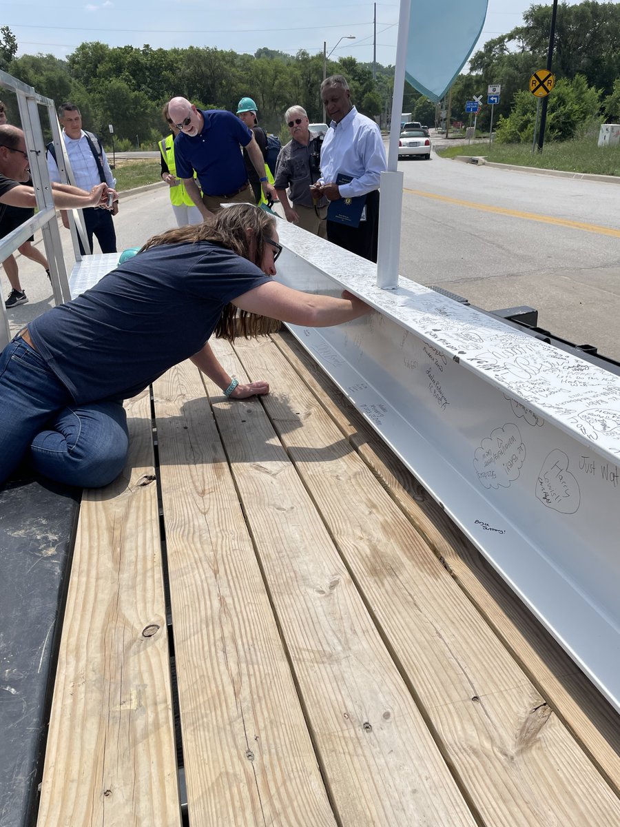 hendersonengs's tweet photo. #TeamHenderson's @andreamulvanyKC &amp; @k_depenning traded their green for teal and attended the @thekccurrent's topping out ceremony, the last beam is in place for the 1st stadium built for women by women. They are changing the world of sports &amp; landscape of #KansasCity. https://t.co/Nm8c1Hpx4w