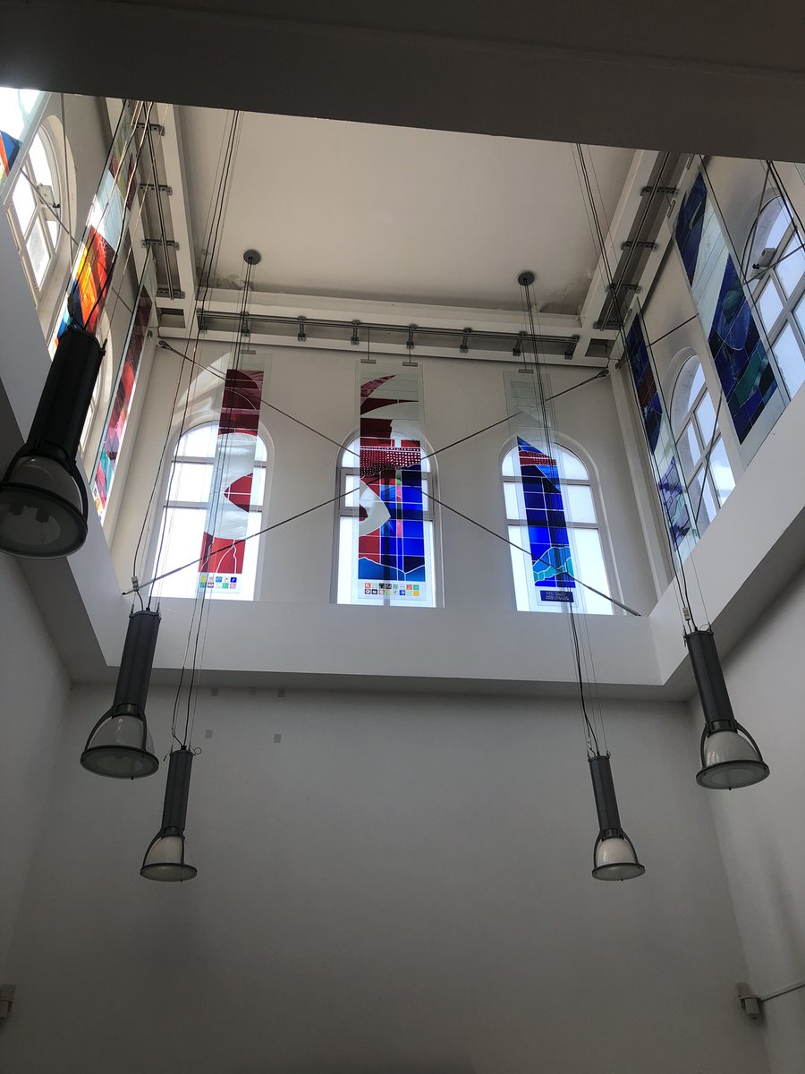 The #IHBCSwansea2023 city centre tour continues in @ArtSwansea and their glass design department. A gorgeous building with fantastic bright studio spaces. #IHBC #Swansea #Conservation #glass #historicglass