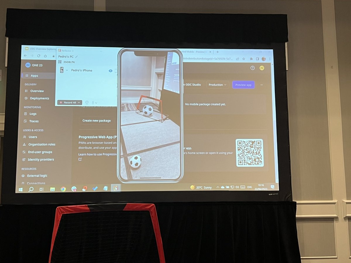 OutSystemsDev's tweet photo. Next up: @poliveira81 has built a new functionality into yesterday’s Neo United ⚽️ app as shown on the main stage. 

Pedro created the ability to play with a virtual soccer ball and score goals via #AugmentedReality through the app!

#ONEOutSystems https://t.co/3Ct9GyQmUX