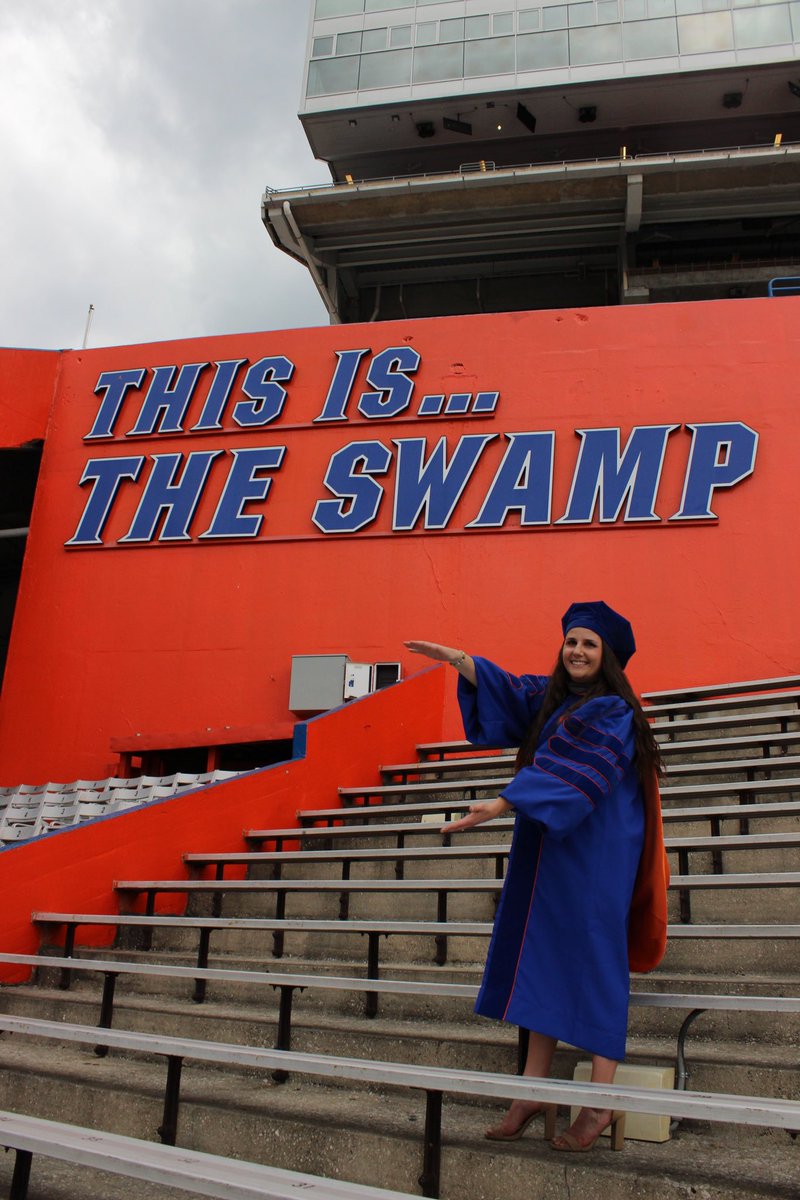 _brocious's tweet photo. After 10 years of college… I’m officially a veterinarian 🧡💙 https://t.co/s5eXMxZbKs