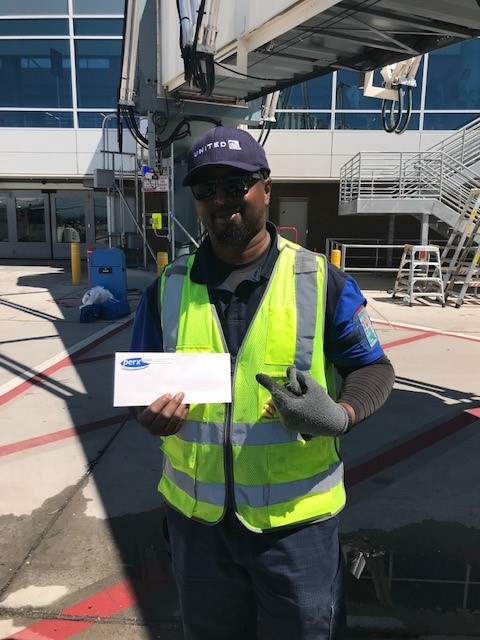 DEN RSE Aaron W. is all smiles after getting his @perxvacations certificate and beginning to think about a vacation. He stopped by the recent DEN Safety Fair to get information on #NoSmallRolesInSafety for himself and peers. @mcgrath_jonna @AOSafetyUAL